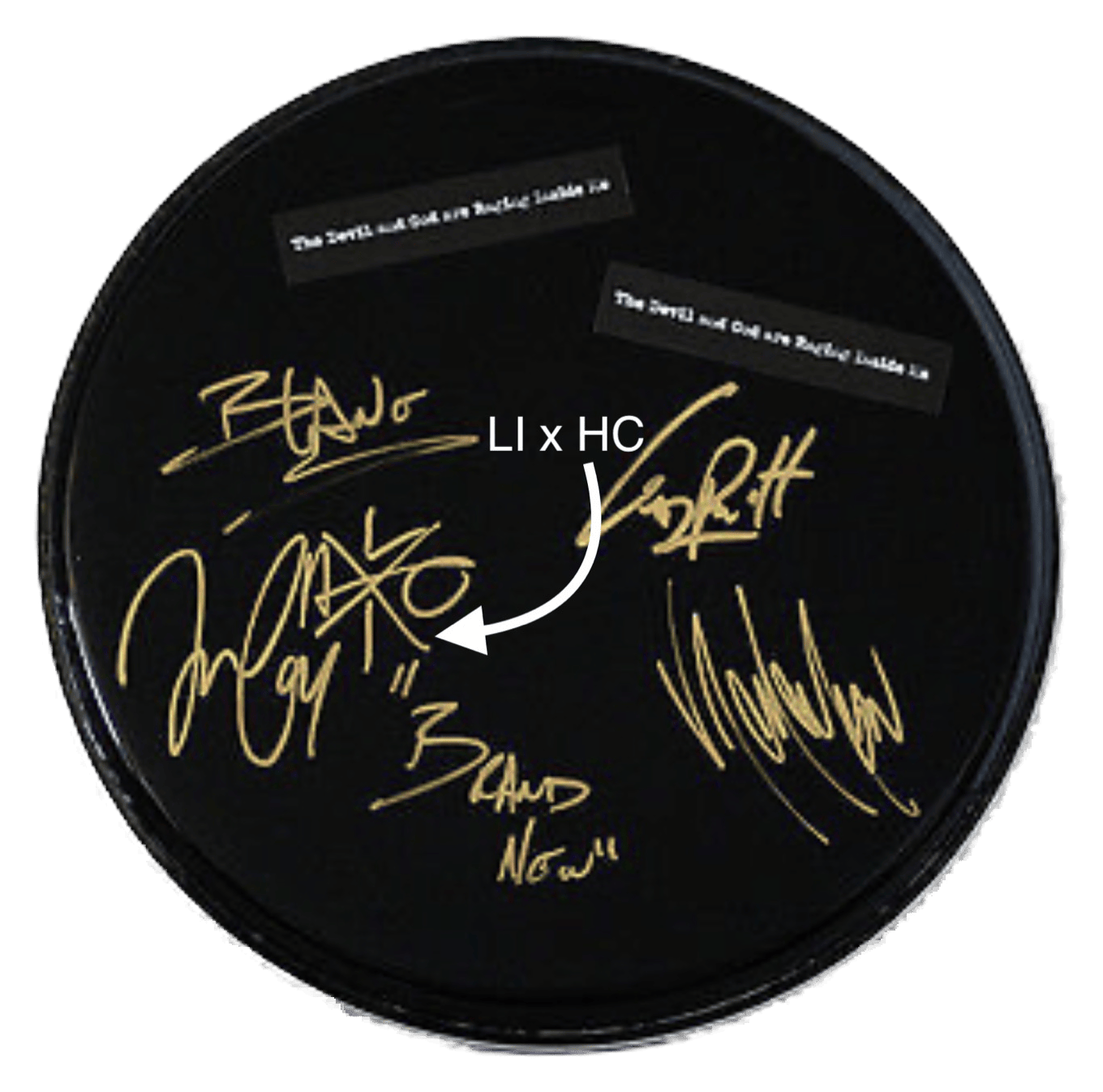A drum head signed by the members of Brand New in gold marker, with 'LIxHC' beside the lead singer's autograph