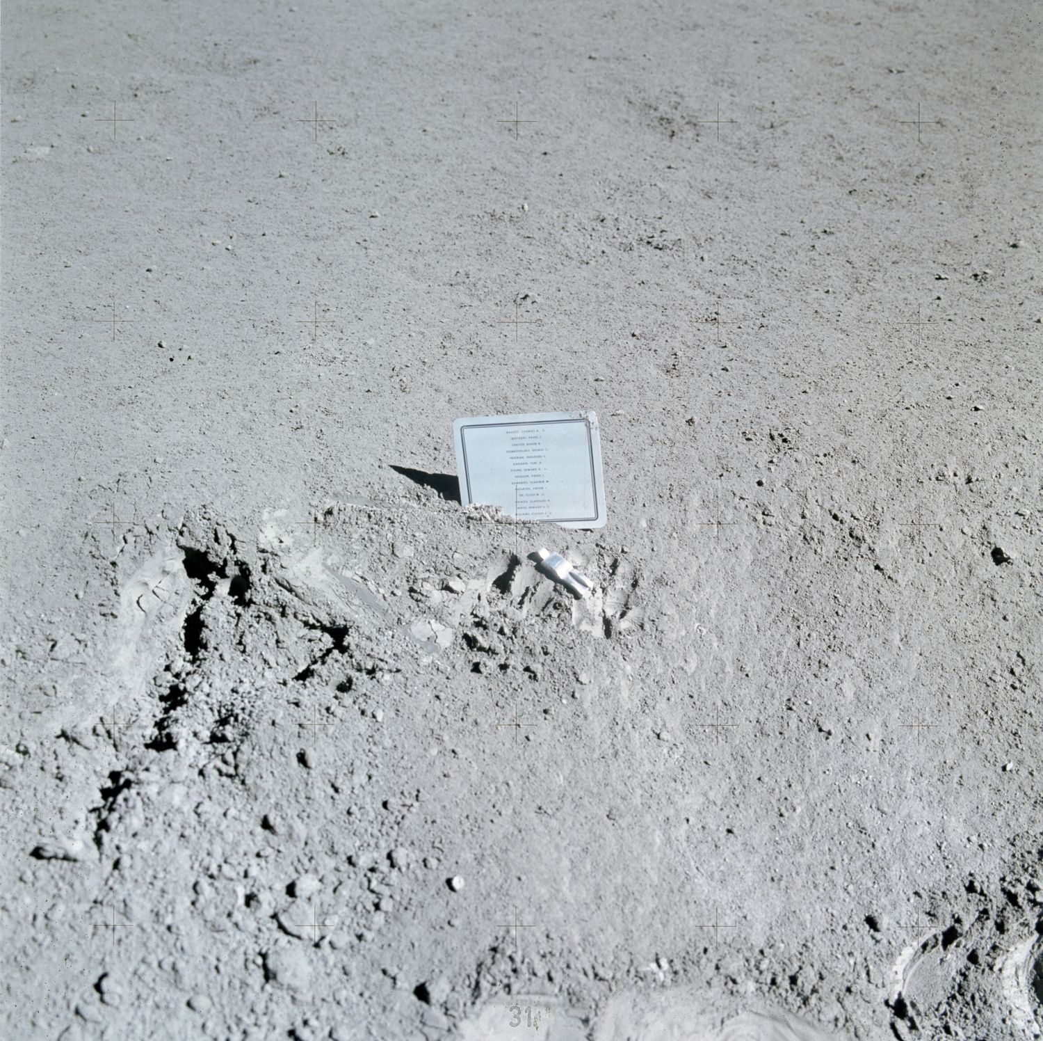 The Fallen Astronaut figurine and plaque on the lunar surface at Hadley, photographed by David Scott