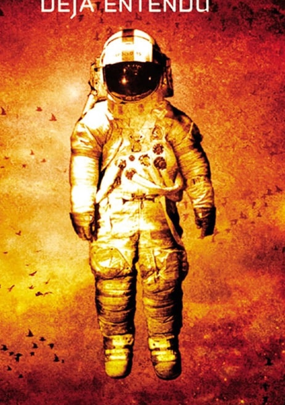 The Deja Entendu cover: the suit, floating over water under a red sky
